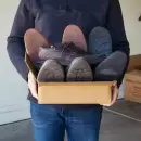 Un jubilado dio todos sus ahorros por error, luego de donar zapatillas a Bah�a Blanca