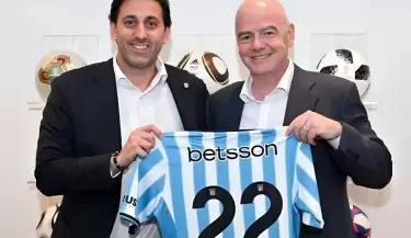 Diego Milito y Gianni Infantino
