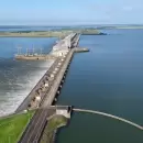 Acuerdo con Paraguay: se fijará un precio único para la energía de Yacyretá y Argentina bajará los costos